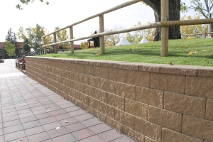 Cornerstone-block-retaining-wall-fence-post-on-top