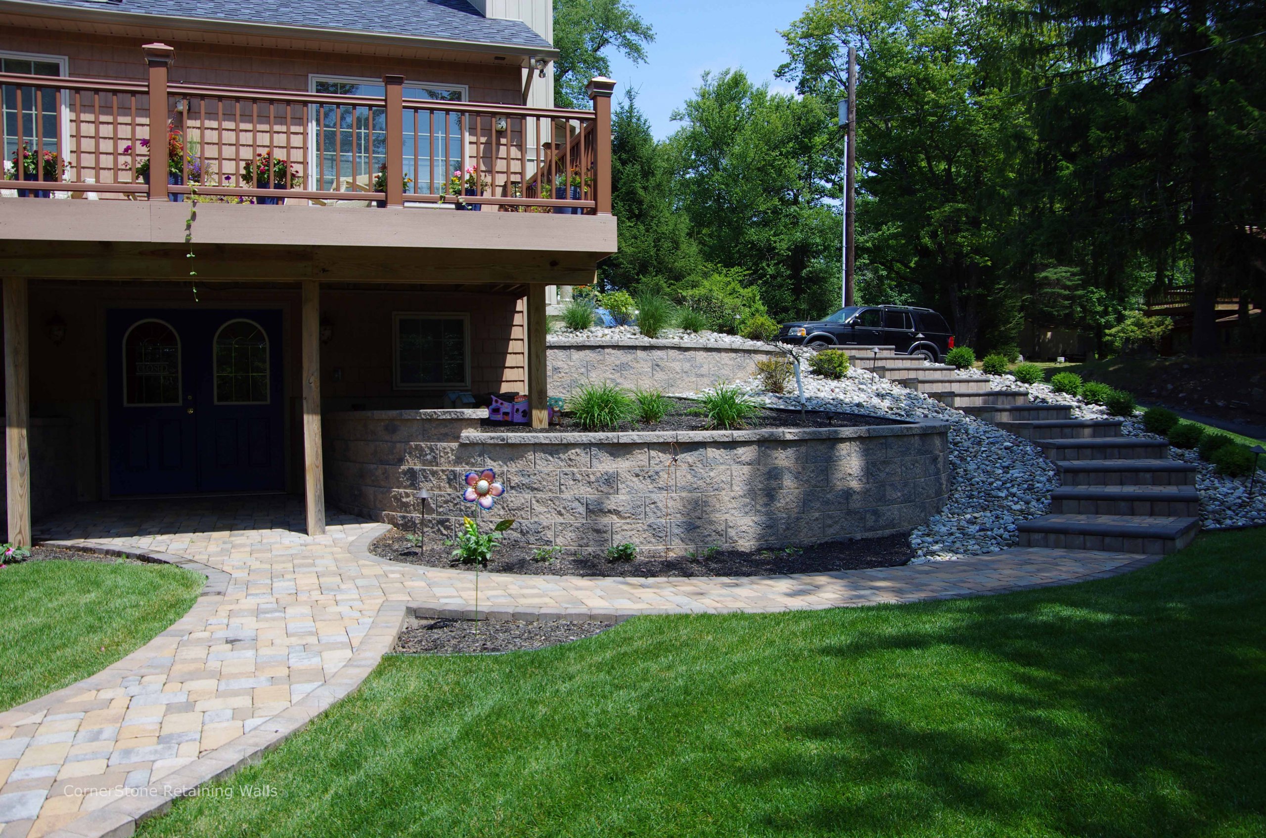 Backyard Curved Retaining Walls with Stairs