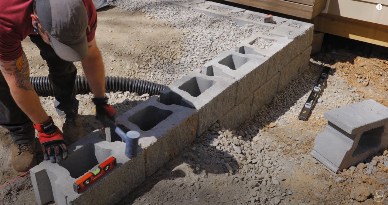 CornerStone retaining wall step-up for base elevation change by Crafted Workshop