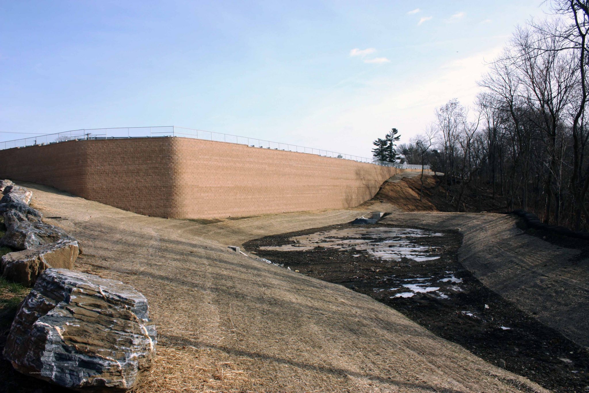 Tall CornerStone Retaining Wall Helps Develop Commercial Infrastructure