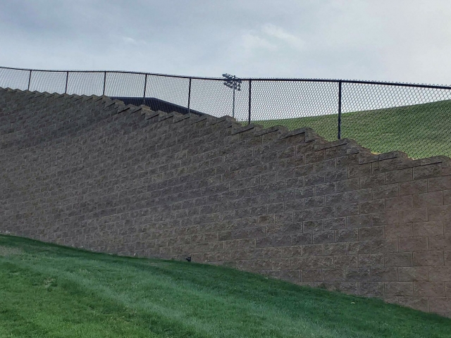 Tall, Fenced CornerStone Retaining Wall in Lynchburgh Virginia