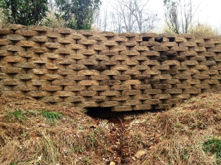 Insufficient base preparation and drainage can lead to dangerous water pooling and erosion behind retaining walls. Insufficient base preparation and drainage can lead to dangerous water pooling and erosion behind retaining walls.