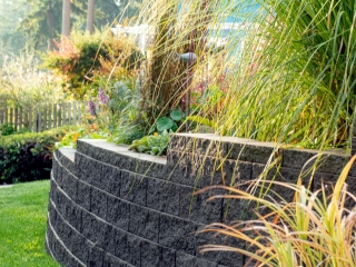 Residential application of CornerStone 100 retaining wall with setback. Residential application of CornerStone 100 retaining wall with setback.