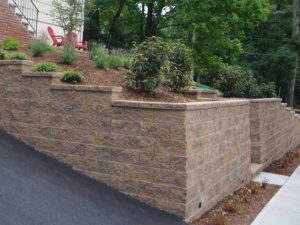 CornerStone 100 landscape retaining wall for driveway with corner design.