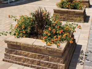 MiraStone retaining wall system corner units for planters.