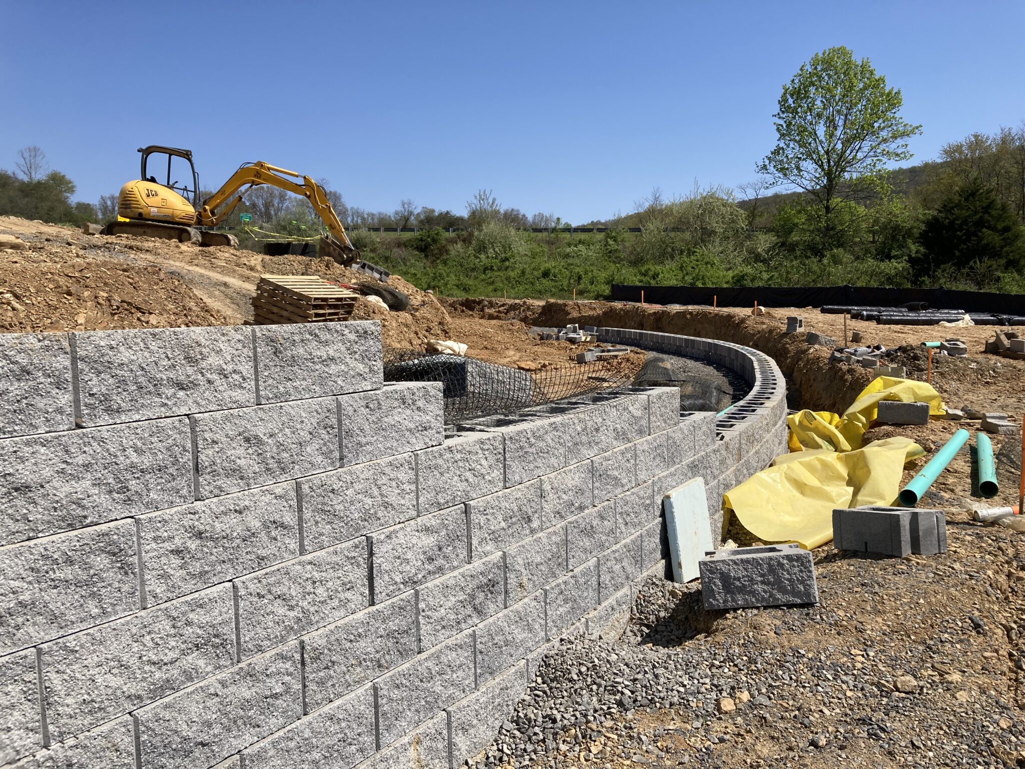 Building large CornerStone 100 retaining walls.