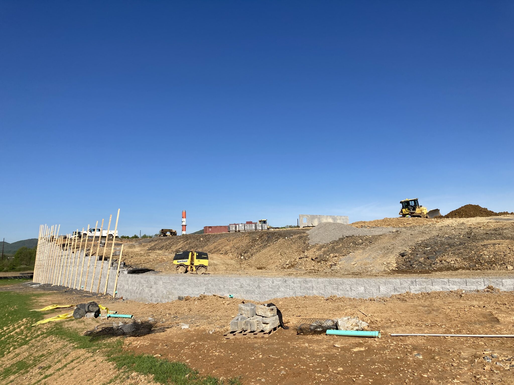 Construction of massive CornerStone 100 retaining wall.