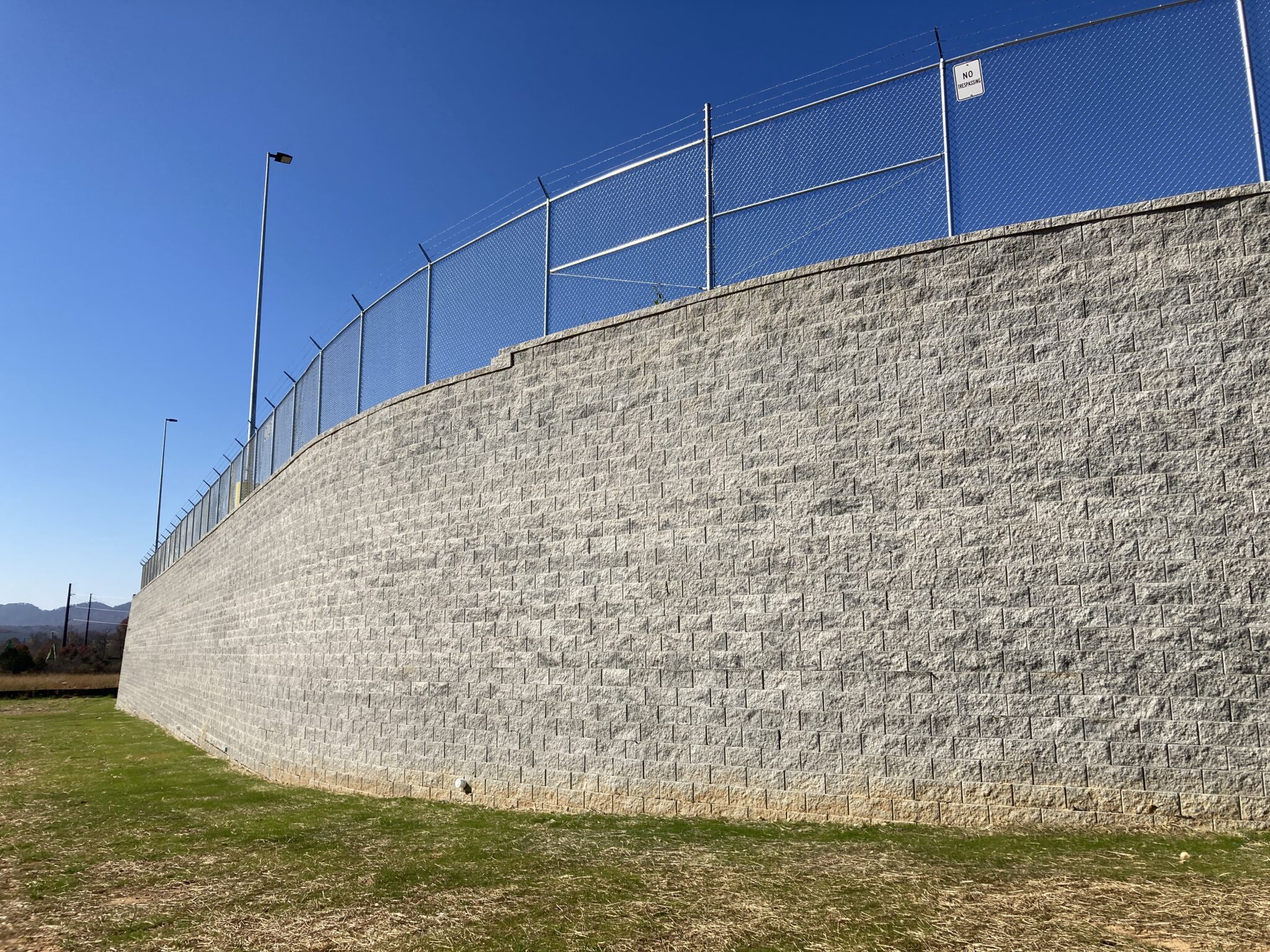 Tall Curved Commercial CornerStone 100 Retaining Wall.